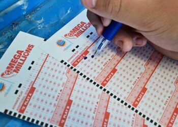 Numbers on tickets for the Mega Millions lottery are selected by a purchaser in Los Angeles, California, on August 4, 2023. The sixth-largest jackpot in US history is up for grabs tonight after no tickets have been sold with all six numbers in the multi-state Mega Millions game for 30 consecutive draws. (Photo by Frederic J. BROWN / AFP) (Photo by FREDERIC J. BROWN/AFP via Getty Images)