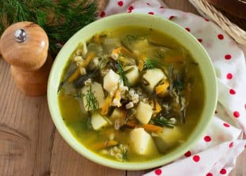 Traditional Russian soup rassolnik with barley, potato and kelp